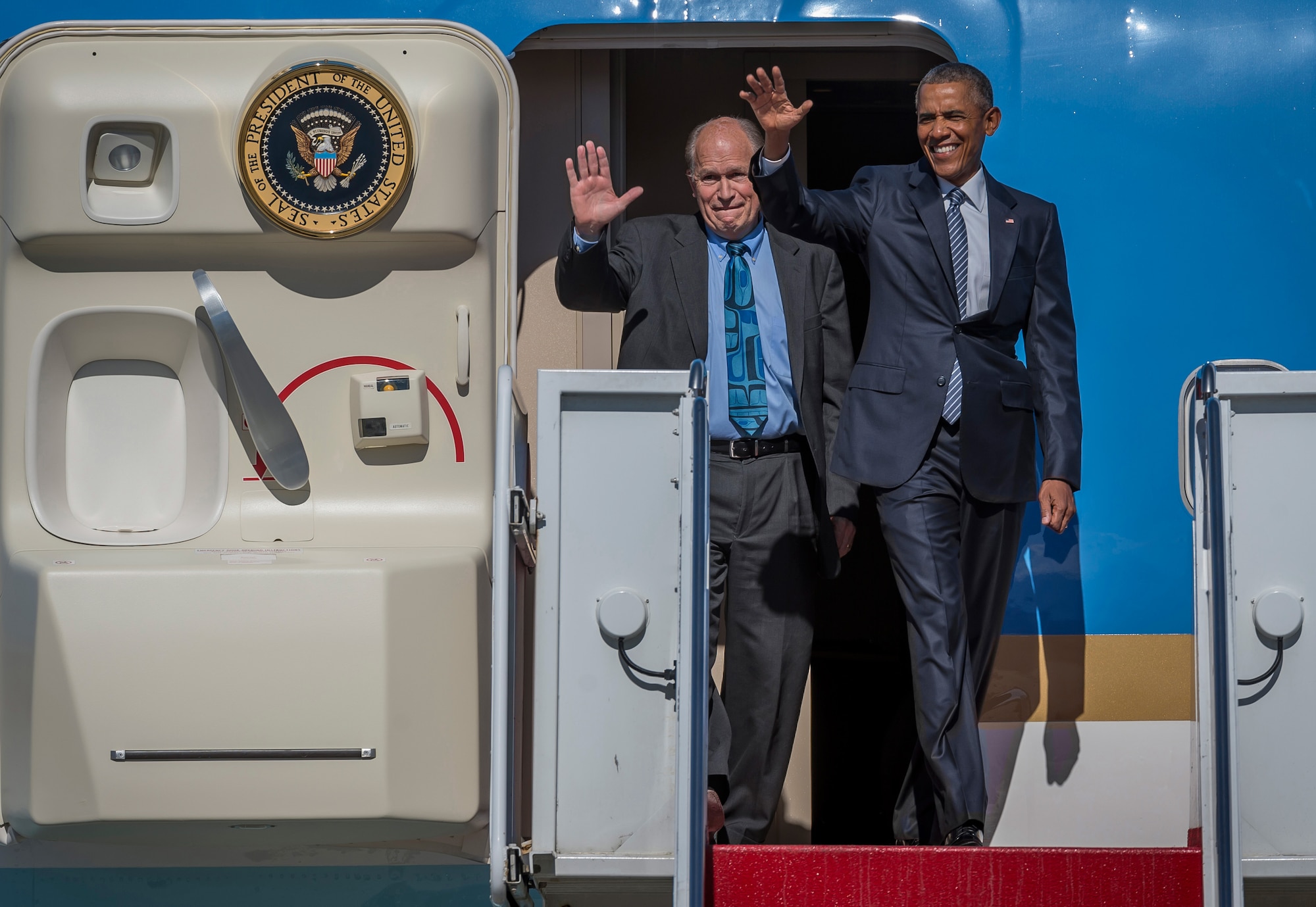 Alaska Gov. Bill Walker, left, and President Barack Obama disembark Air Force One at Joint Base Elmendorf-Richardson, Alaska, Monday, Aug. 31, 2015. President Obama was the main speaker at a major event yesterday in Anchorage, Alaska, hosted by the U.S. Department of State entitled the Conference on Global Leadership in the Arctic: Cooperation, Innovation, Engagement and Resilience (GLACIER). GLACIER will focus the world’s attention on the most urgent issues facing the Arctic today and provide an unprecedented opportunity for foreign ministers and key stakeholders to define the region’s most crucial challenges; highlight innovative ways in which these challenges can be addressed at the local, national and international levels; and broaden global awareness of the impacts of Arctic climate change.  (U.S. Air Force photo/Justin Connaher)