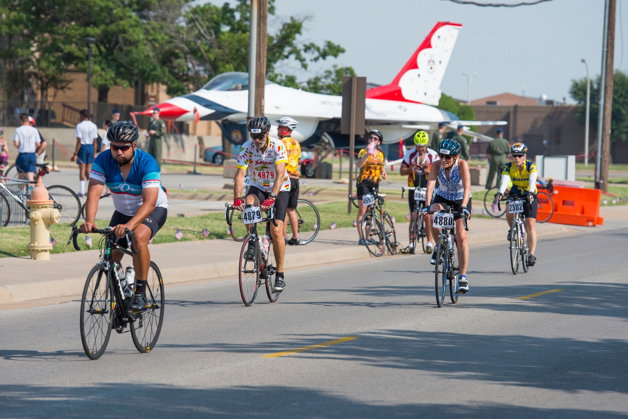 Cyclists pass through Sheppard Air Force Base, Texas, during the Hotter’N Hell 100 bike race, Aug. 29, 2015. This year, the event stared with a mountain bike race on Friday, Aug. 28, an endurance race, Saturday, and a trail run the following Sunday. Sheppard has opened its gates to the riders for the past 34 years. (U.S. Air Force photo by Senior Airman Kyle Gese/Released)