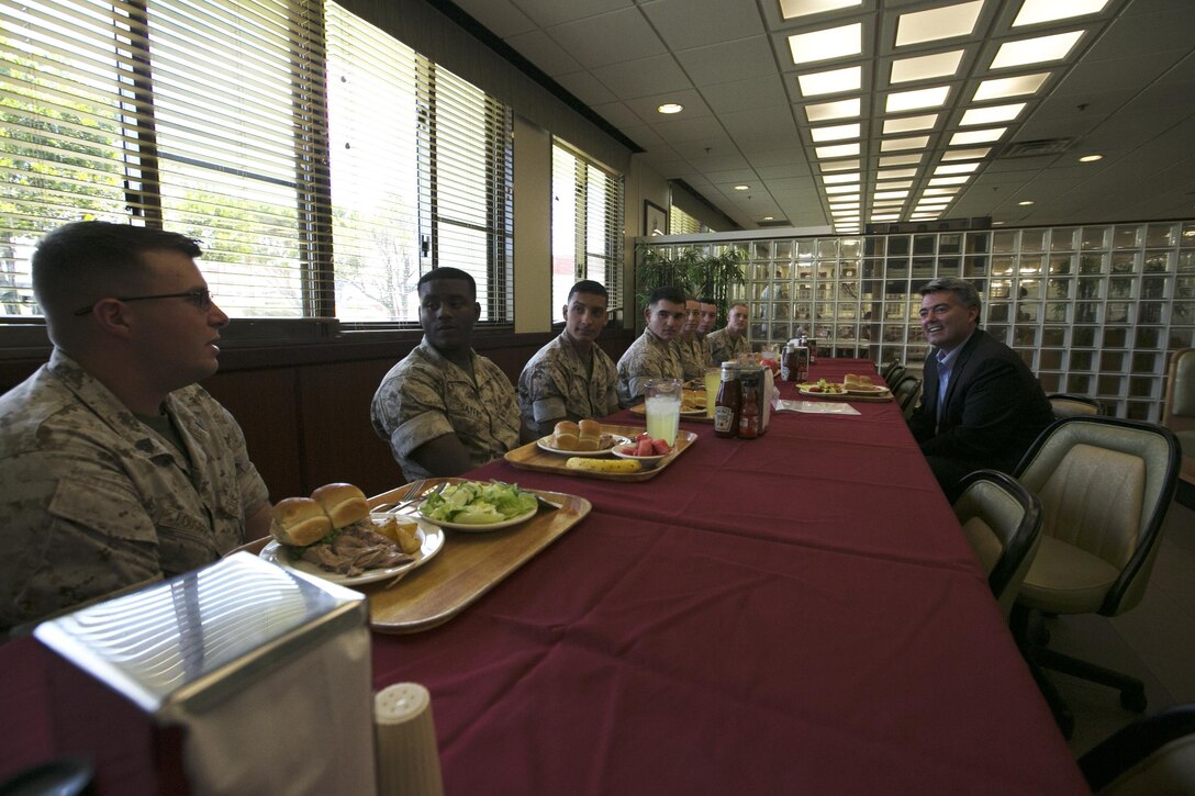 Colorado Sen. Corey Gardner met with Colorado resident Marines at the mess hall aboard Marine Corps Air Station Futenma Aug. 18. Gardner ate lunch and conversed with his constituents stationed in Okinawa. (U.S. Marine Corps Photo by Lance Cpl. Daniel Jean-Paul/Released)
