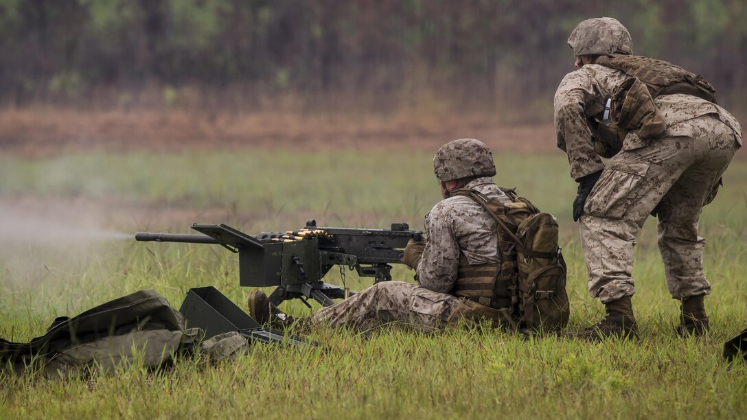 A Marine with 2nd Air Naval Gunfire Liaison Company fires the M2 .50 Caliber Heavy Machine Gun during a week-long field exercise at Camp Lejeune, N.C., Aug. 27, 2015. The training increased the unit’s readiness and upheld the standards in support of II Marine Expeditionary Force and re-familiarized them with the weapons system. (U.S. Marine Corps photo by Cpl. Krista James/Released)