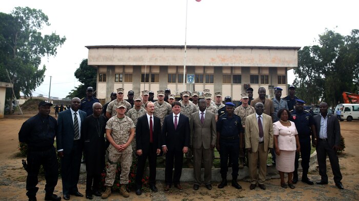 U.S. and Benin officials take time to pose for a photos, Aug. 31, 2015, after the opening ceremony that officially started training between U.S. Marines and sailors and Benin's National Surveillance Police at Benin's National Police Academy in Cotonou, Benin. Today’s ceremony marks a new milestone of the partnership between Benin and the U.S. This training is the first time in the Nation Surveillance Police’s 10-year history a foreign military has come to train and mentor the specialized unit. 