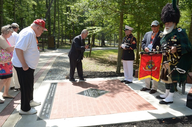 Ron Kincade, who served with 1st Battalion, 1st Marines, in Vietnam, looks at the newly dedicated memorial.