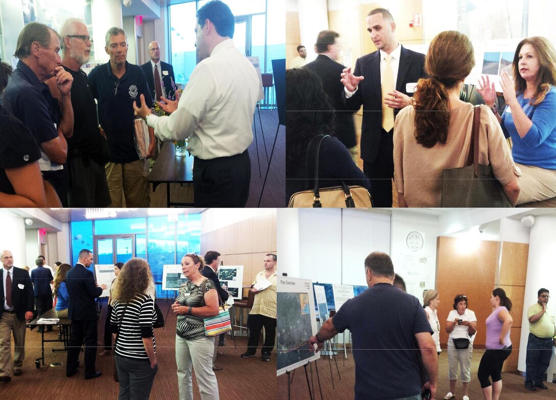 Army Corps technical specialists respond to individual questions from citizens at a Public Information Meeting in Richmond County, N.Y. about the South Shore of Staten Island Coastal Storm Risk Management Project
