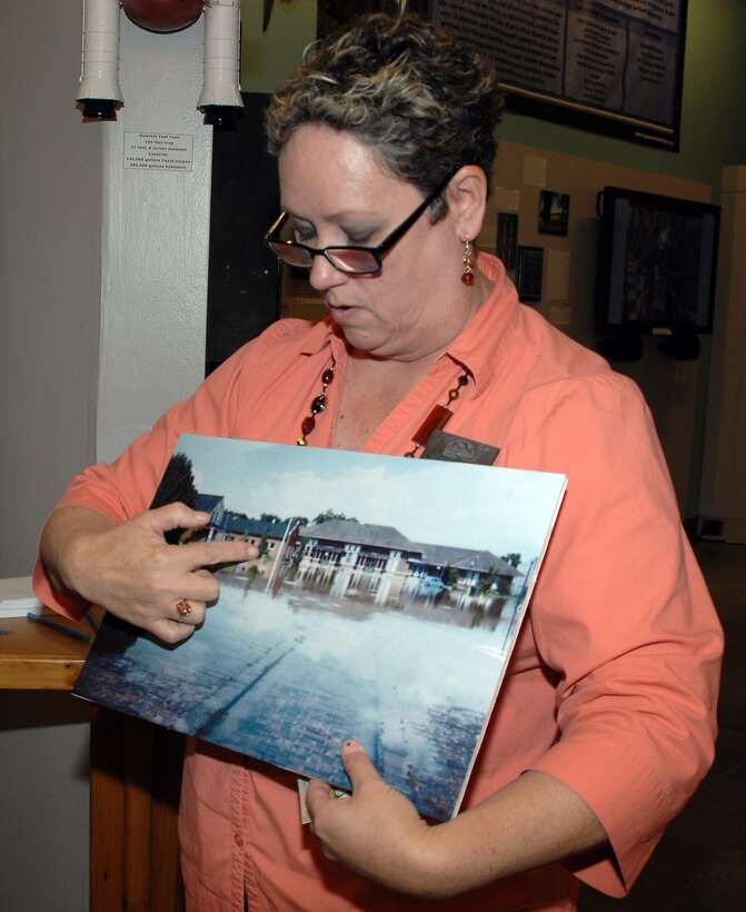 Lisa Lofton, program coordinator, Thronateeska Heritage Center in Albany, Georgia, talks about the 1994 flood that submerged Albany during the 20th remembrance of the disaster in July 2014. Thronateeska Heritage Center displayed the Flood of Memories exhibit for the public to tour and to commemorate the tragedy. According to an article in The Emblem dated July 8, 1994, the flood resulted from the predicted Tropical Storm Alberto, which turned into a tropical depression.