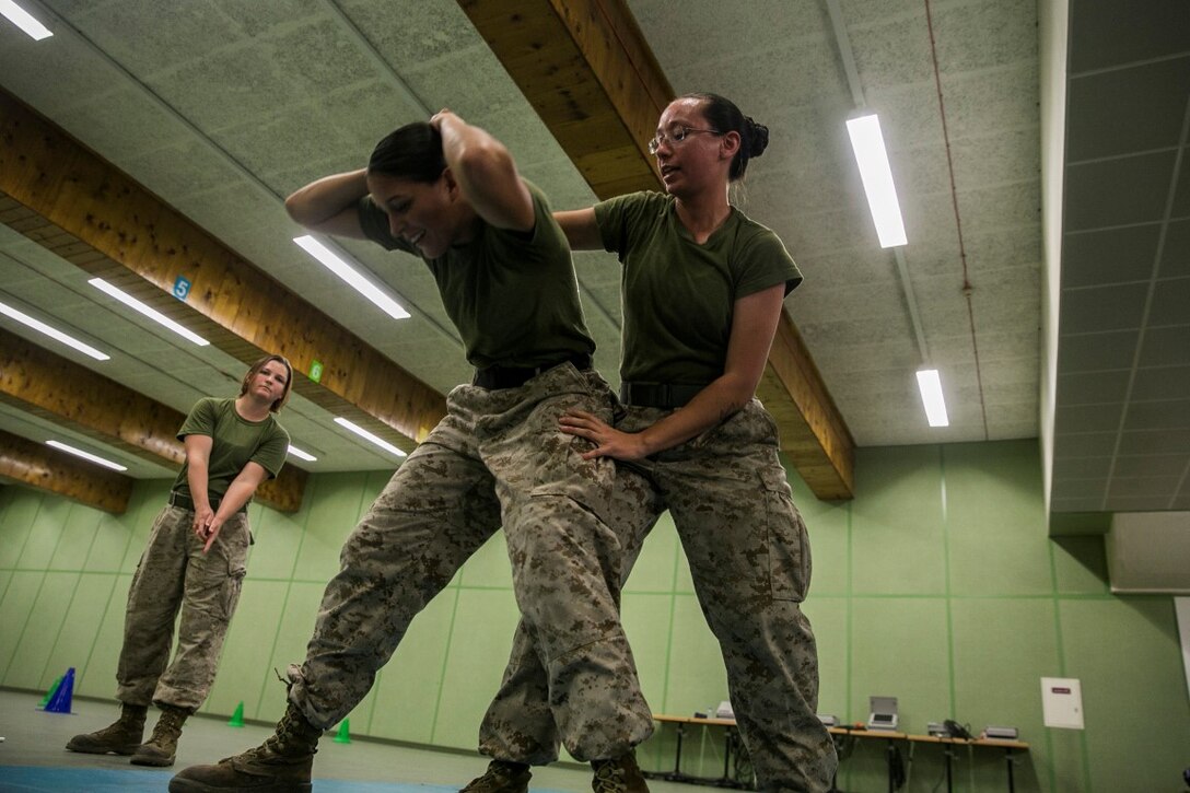 QATAR (Aug 18, 2015)
U.S. Marines with the Female Partner Force Engagement Team demonstrate searching techniques during a subject matter expert exchange with the Qatari Internal Security Forces Female VIP Protection Unit in Qatar. The FPFET was comprised of U.S. Marines with the 15th Marine Expeditionary Unit as well as Soldiers and Sailors with Special Operations Command Central-Forward and Joint Special Operations Task Force-Arabian Peninsula. During the SMEE they covered medical care, marksmanship, and personal security detail strategies. (U.S. Marine Corps photo by Cpl. Anna Albrecht/Released)