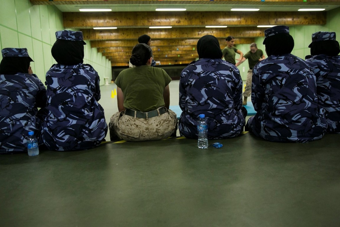 QATAR (AUG. 19, 2015)
U.S. Marines with the Female Partner Force Engagement Team demonstrate Marine Corps Martial Arts Program during a subject matter expert exchange with the Qatari Internal Security Forces Female VIP Protection Unit in Qatar. The FPFET was comprised of U.S. Marines with the 15th Marine Expeditionary Unit as well as Soldiers and Sailors with Special Operations Command Central-Forward and Joint Special Operations Task Force-Arabian Peninsula. During the SMEE they covered medical care, marksmanship, and personal security detail strategies. (U.S. Marine Corps photo by Cpl. Anna Albrecht/Released)