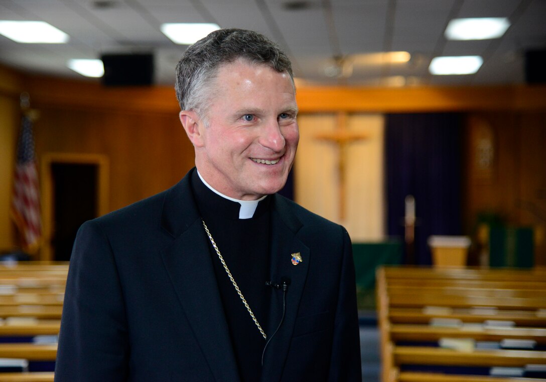 Archbishop Timothy Broglio, Archbishop of the Military Services, smiles during an interview at the chapel on Osan Air Base, Osan Air Base, Aug. 26, 2015. Broglio recently stopped by Osan AB, along with various military installations on the Korean peninsula to visit with service members and their families who are part of the Catholic community. (U.S. Air Force photo/Senior Airman Kristin High)