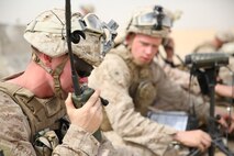 U.S. Marine Sgt. Danny Holzworth, a Joint Terminal Attack Controller, with the Special Purpose Marine Air Ground Task Force—Crisis Response—Central Command calls in mortar strikes during a Fire Support Coordination Exercise (FSCEX)  in an undisclosed location in Southwest Asia, Aug. 25, 2015. The FSCEX is a SPMAGTF and 15th Marine Expeditionary Unit combined arms exercise designed to promote interoperability between the two Marine Corps contingency response forces in the Central Command Area of Operations. (U.S. Marine Corps photo by Cpl. Jonathan Boynes)