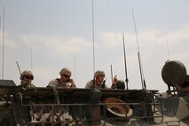 A Fire Support Team (FiST) with the 15th Marine Expeditionary Unit, call in mortar strikes during a Fire Support Team exercise (FSCEX) in an undisclosed location in Southwest Asia, Aug. 25, 2015. The FSCEX is a SPMAGTF and 15th Marine Expeditionary Unit combined arms exercise designed to promote interoperability between the two Marine Corps contingency response forces in the Central Command Area of Operations. The 15th MEU is embarked aboard the ships of the Essex Amphibious Ready Group and deployed to maintain regional security in the U.S. 5th Fleet area of operations.  (U.S. Marine Corps photo by Cpl. Jonathan Boynes)