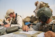 A Fire Support Team (FiST) from Battalion Landing Team 3rd Battalion, 1st Marine Regiment, 15th Marine Expeditionary Unit, identify and call in artillery strikes during a Fire Support Coordination Exercise (FSCEX) in an undisclosed location in Southwest Asia Aug. 25, 2015. The FSCEX is a SPMAGTF and 15th Marine Expeditionary Unit combined arms exercise designed to promote interoperability between the two Marine Corps contingency response forces in the Central Command Area of Operations.  BLT 3/1, 15th MEU’s ground combat element, is embarked on the Essex Amphibious Ready Group and deployed to maintain regional security in the U.S. 5th Fleet area of operations. (U.S. Marine Corps photo by Cpl. Jonathan Boynes)