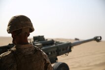 An Artillery Marine with India Battery, Battalion Landing Team 3rd Battalion, 1st Marine Regiment, 15th Marine Expeditionary Unit, breaks down an M777 Howitzer during a Fire Support Coordination Exercise (FSCEX) in an undisclosed location in Southwest Asia, Aug. 25, 2015.  The FSCEX is a SPMAGTF and 15th Marine Expeditionary Unit combined arms exercise designed to promote interoperability between the two Marine Corps contingency response forces in the Central Command Area of Operations. BLT 3/1, 15th MEU’s ground combat element, is embarked on the Essex Amphibious Ready Group and deployed to maintain regional security in the U.S. 5th Fleet area of operations.  (U.S. Marine Corps photo by Cpl. Jonathan Boynes)