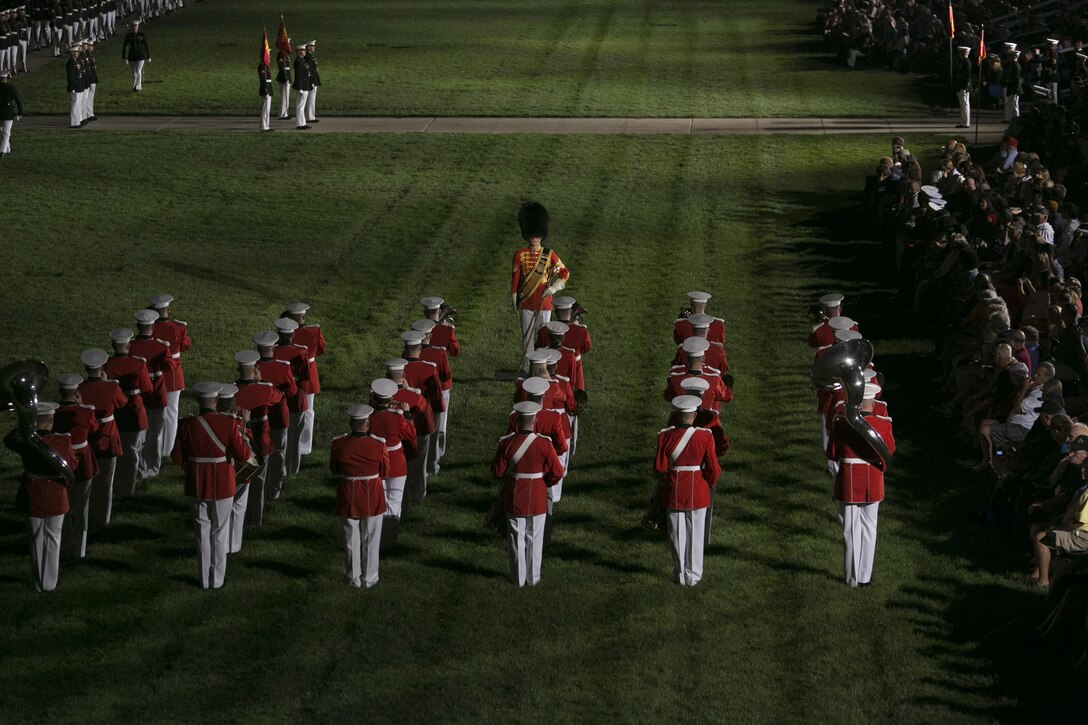 the United States Marine Band performs during a Friday Evening Parade at Marine Barracks Washington, D.C., Aug. 28, 2015. Two Marine Barracks Washington Marines, Sgt. Jonathan W. Patrick, Alpha Company, and Lance Cpl. Kyle F. McDonald, Guard Company, were the guests of honor for the parade and Gen. Joseph F. Dunford Jr., 36th commandant of the Marine Corps, was the hosting official. (U.S. Marine Corps photo by Cpl. Christian Varney/Released)