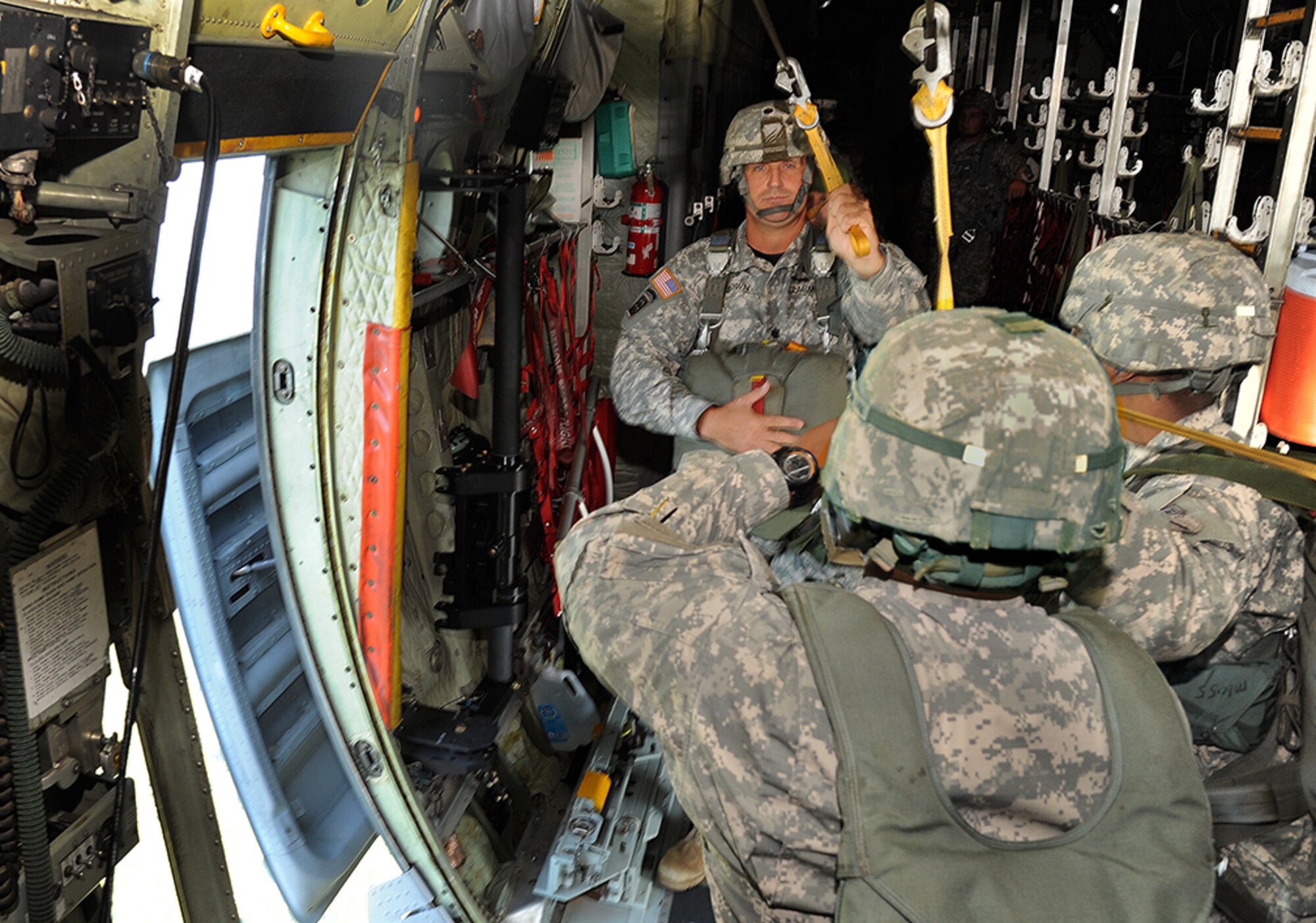 Lt. Col. Korey Brown, commander of 1st Battalion, 507th Parachute Infantry Regiment, the airborne school training unit, prepares to exit the aircraft. (Photo by Lt. Col. Jerry Lobb)