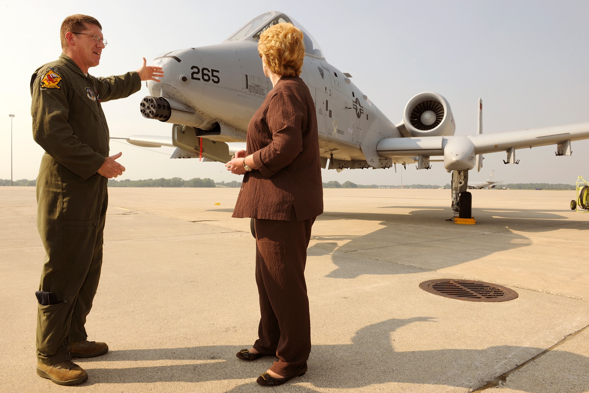 150902-Z-EZ686-085 -- Col. Douglas Champagne, commander of the 127th Operations Group and an A-10 Thunderbolt II pilot, explains the capabilities of the aircraft to U.S. Sen. Debbie Stabenow, D-Mich., during a visit by a Congressional delegation to Selfridge Air National Guard Base, Mich., Sept. 2, 2015. Selfridge was the first stop on a two-day tour of all of Michigan major military installations. Seven Michigan members of Congress and many of their staff aides participated in the trip. (U.S. Air National Guard photos by Master Sgt. David Kujawa / Released)