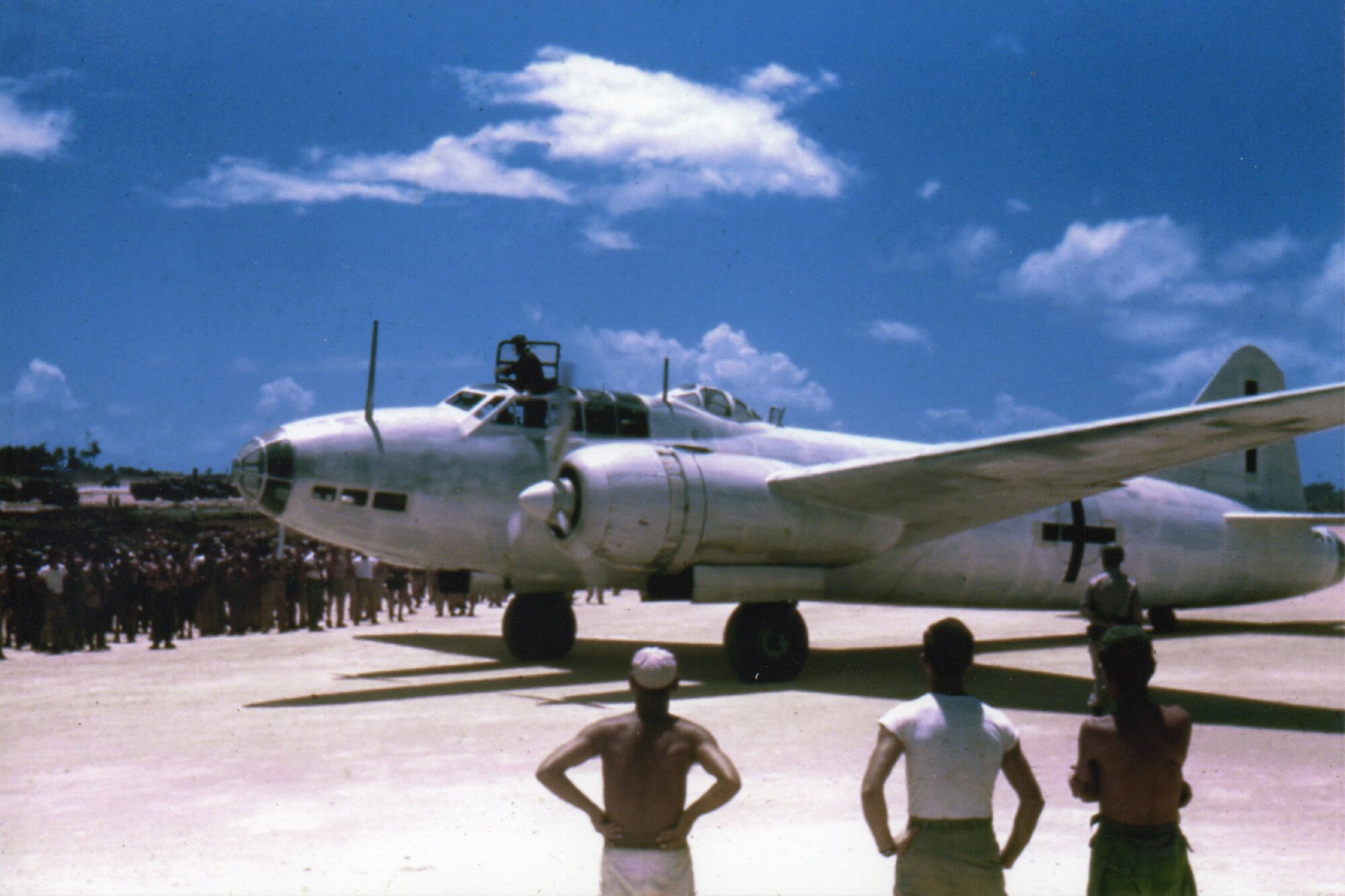 Sgt. Fred Hill captured the momentous arrival of an Imperial Japanese Navy Mitsubishi BETTY bomber on Ie Shima, off the coast of Okinawa, on 19 August 1945. To many servicemen witnessing the event this was clear evidence that the war was indeed over.  (Courtesy Mr. Fred Hill)