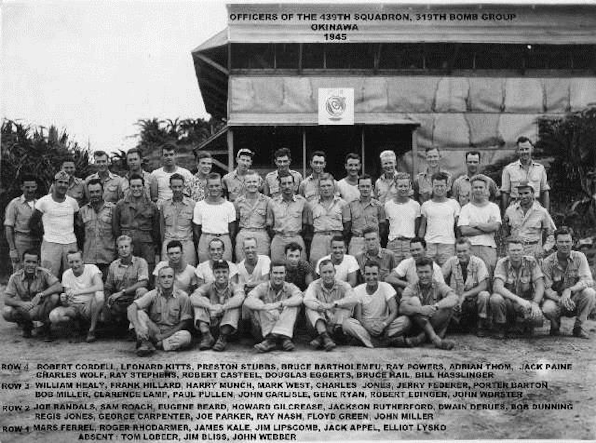 Officers of the 439th Bomb Squadron gather for a picture in front of their mess on Okinawa, late in World War II.  They were part of the 319th Bomb Group which transferred from the war in Europe to help finish the war in the Pacific.  Today the unit is the 114th Fighter Squadron of the Oregon Air National Guard, at Kingsley Field, Oregon. (Courtesy 319th Bomb Group Association)