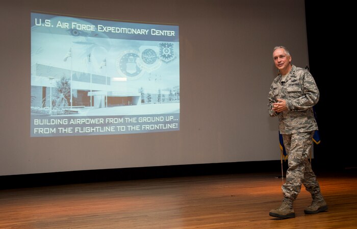Maj. Gen. Frederick H. Martin, U.S. Air Force Expeditionary Center commander, Joint Base McGuire-Dix-Lakehurst, New Jersey, talks to Airmen and Sailors during an all call Sep. 1, 2015, at the base movie theater on Joint Base Charleston, S.C. The U.S. Air Force Expeditionary Center is the Air Force's Center of Excellence for advanced expeditionary combat support training and education, while also providing direct oversight for en route and installation support, contingency response, and partner capacity building mission sets within the global mobility enterprise. The Expeditionary Center provides operational control of the Expeditionary Operations School and administrative control for six wings and two groups within Air Mobility Command. (U.S. Air Force photo/Airman 1st Class Clayton Cupit)