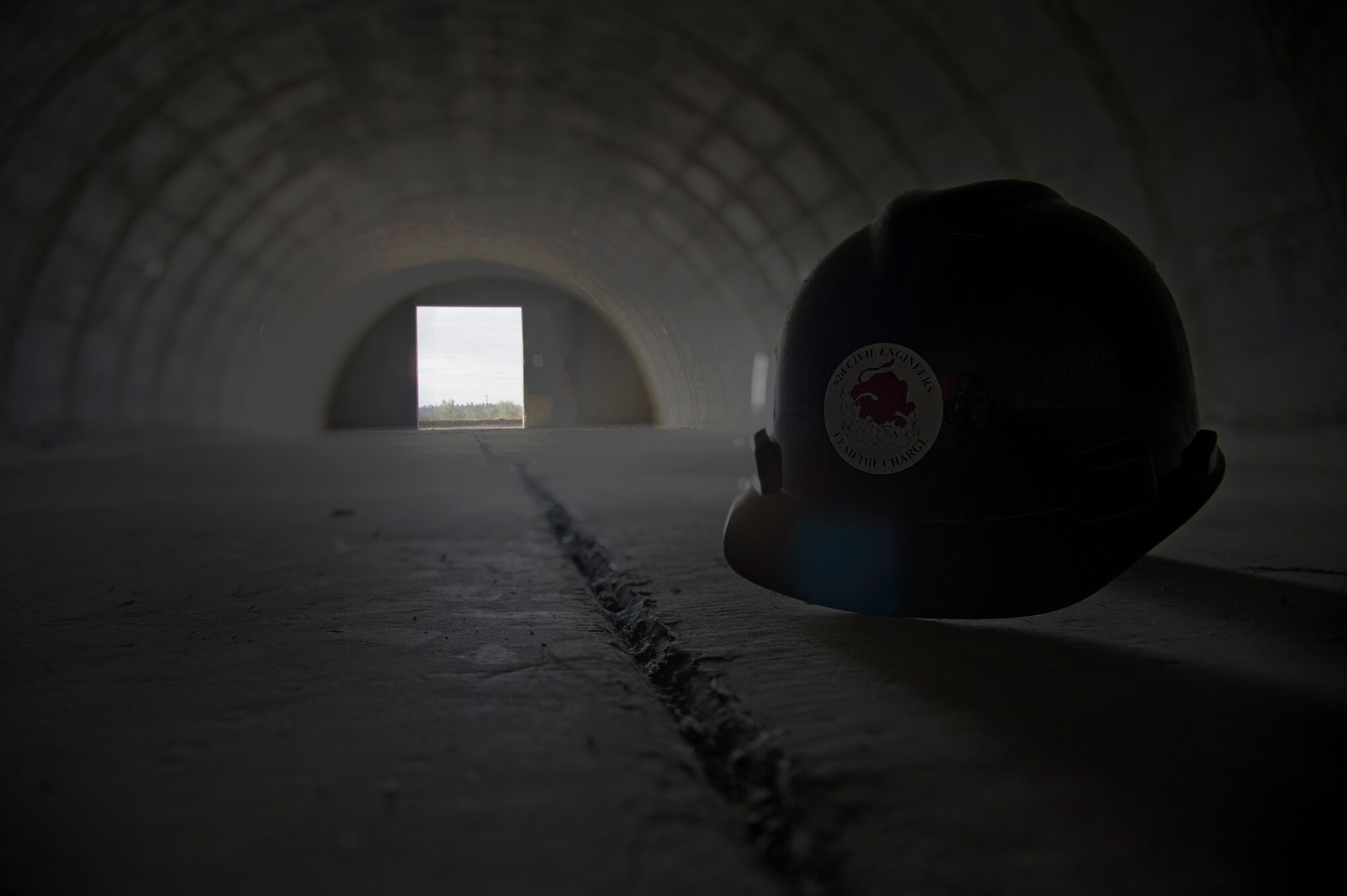 The 92nd Civil Engineer Squadron and the 92nd Contracting Squadron have broken ground with the demolition of the 1950s-era munitions bunkers located at Fairchild Air Force Base, Wash. The project has been a year in the making and is making headway with a projected completion date in 2016. (U.S. Air Force photo/Airman 1st Class Nicolo J. Daniello)