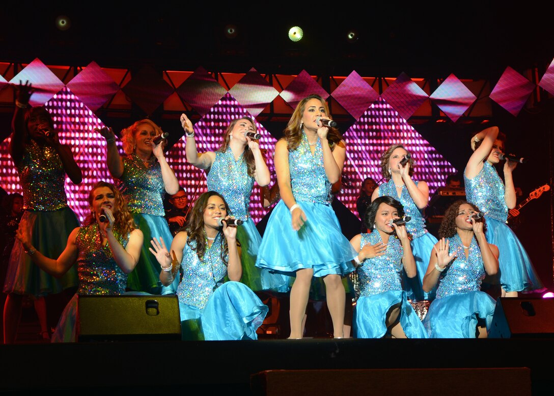U.S. Air Force Airmen from Tops in Blue perform during the 2015 Tops in Blue World Tour Aug. 28, 2015, at the Abilene Civic Center in Abilene, Texas. The mission of Tops in Blue is to entertain military personnel and their families around the world, raise morale and educate audiences on topics such as resiliency and social issues through musical performances and inspire them to action. (U.S. Air Force photo by Senior Airman Kedesha Pennant/Released)