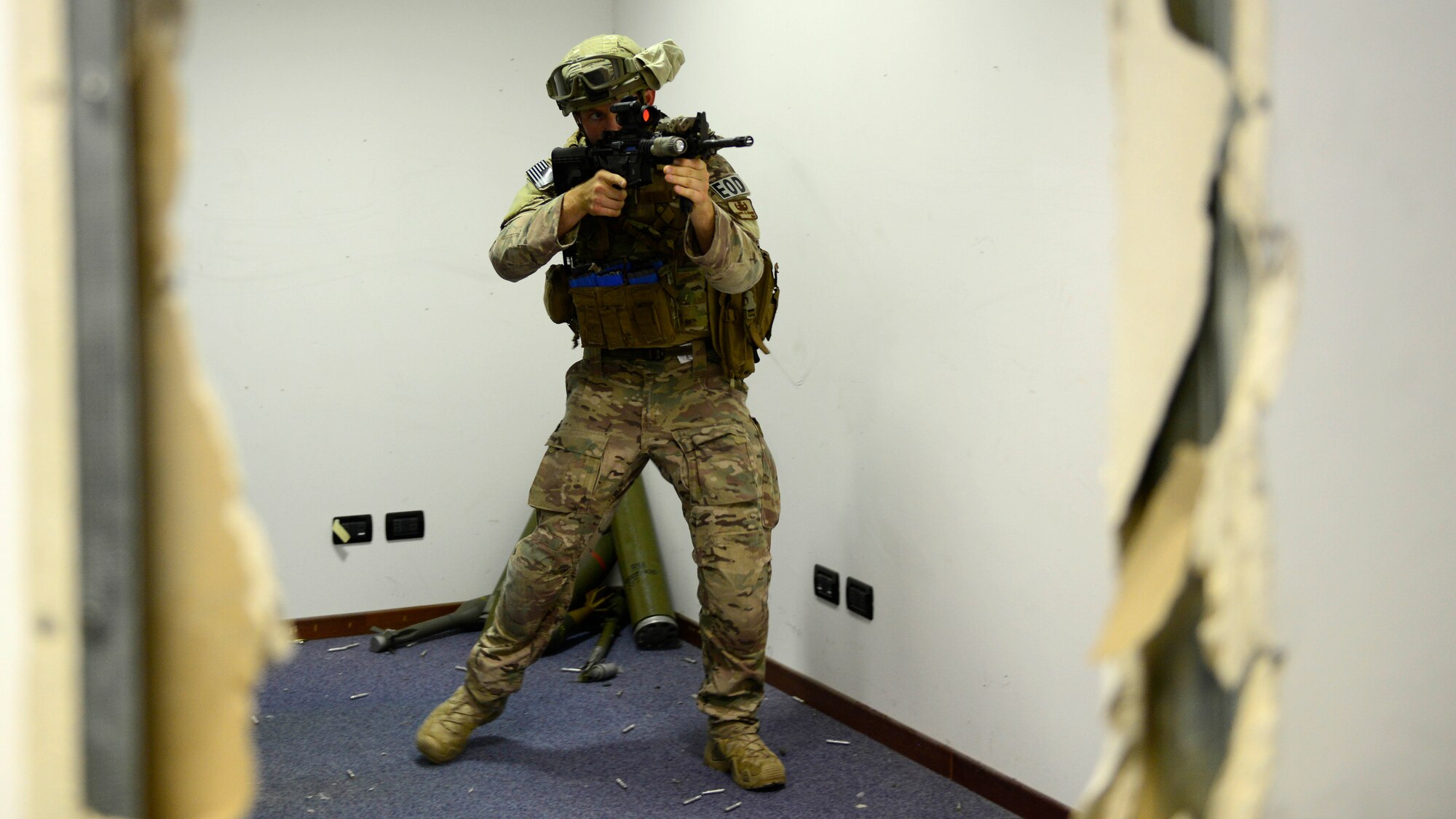 U.S. Air Force Senior Airman Sam Bassin, 31st Civil Engineer Squadron Explosive Ordnance Disposal journeyman, participates in close-quarters battle training, Sept. 1, 2015 at Aviano Air Base, Italy. The training included classroom instruction and a hands-on portion where the participants learned how to work as a team in a close-quarters battle environment. (U.S. Air Force photo by senior Airman Areca T. Wilson/Released)