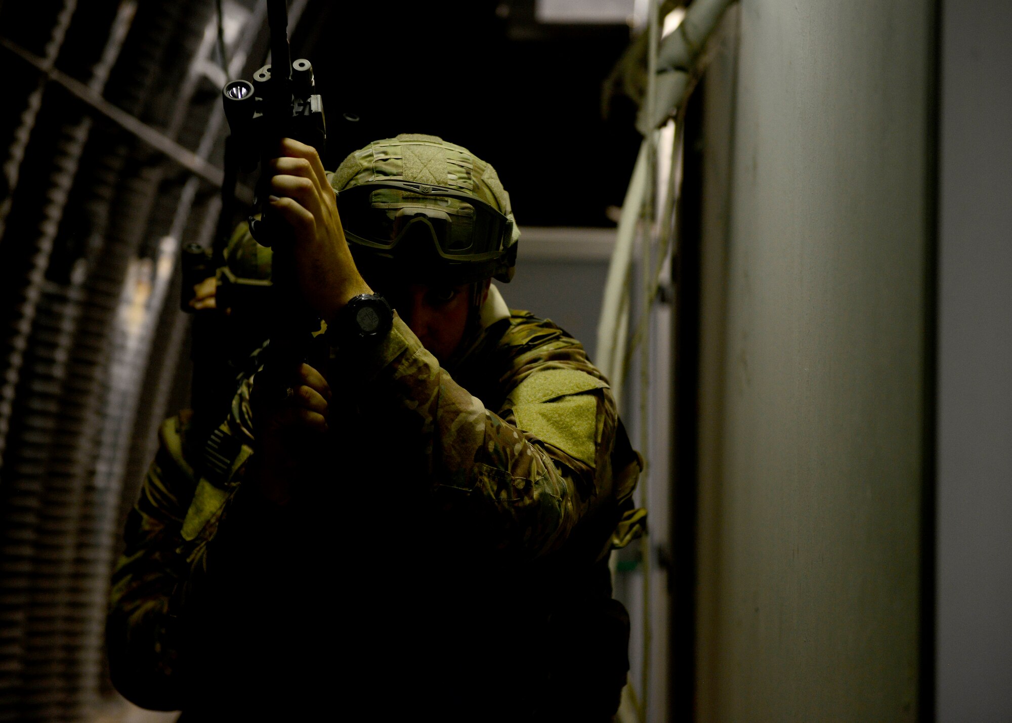 U.S. Air Force Capt. Kyle Fuller, 31st Civil Engineer Squadron Explosive Ordnance Disposal flight chief, participates in close-quarters battle training, Sept. 1, 2015 at Aviano Air Base, Italy. The training included classroom instruction and a hands-on portion where the participants learned how to work as a team in a close-quarters battle environment. (U.S. Air Force photo by senior Airman Areca T. Wilson/Released)