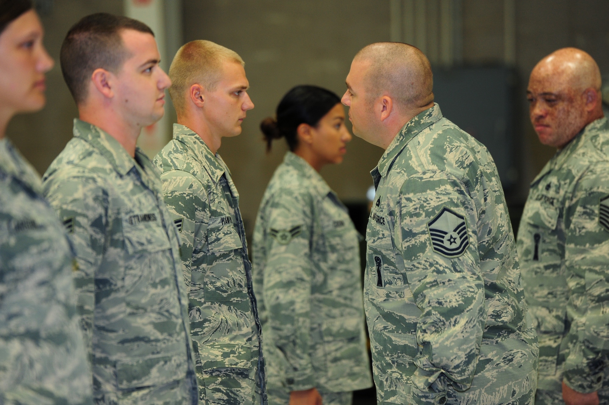 Airmen from the 509th Bomb Wing and the Missouri Air National Guard’s 131st Bomb Wing stand in formation during a dress and appearance inspection Aug. 11, 2015, at Whiteman Air Force Base, Mo. The inspection commenced the weapons loading, aircraft crew chief and munitions maintenance portion of the Global Strike Challenge. (U.S. Air Force photo by Airman 1st Class Jazmin Smith/Released)