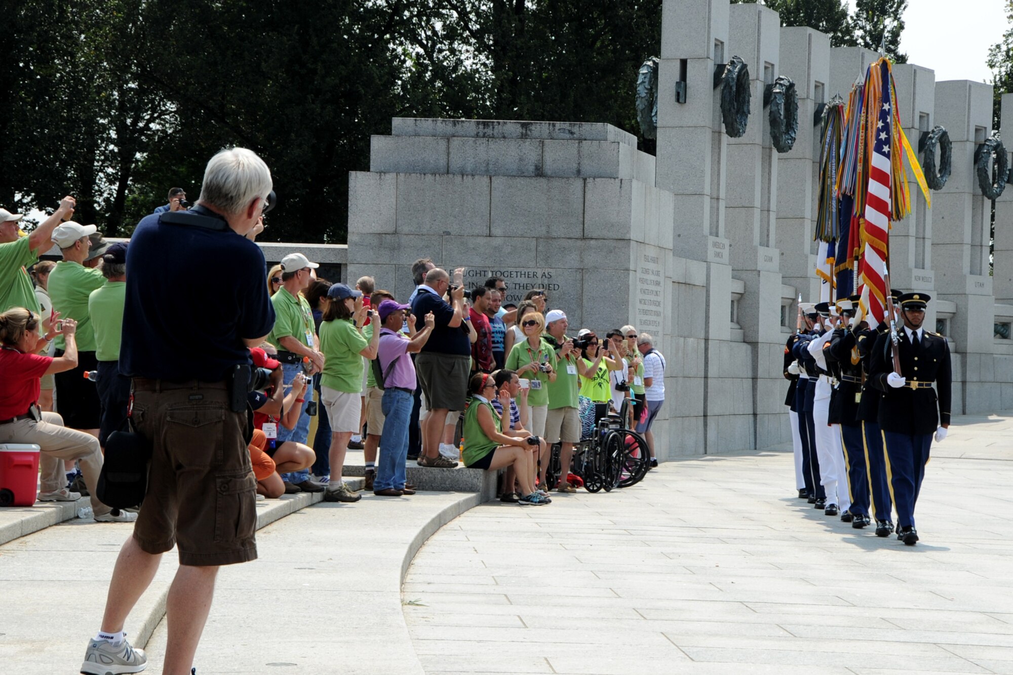 The USAF Honor Guard joins a Joint Service Color Team to pay tribute to
World War II veterans from the Chicago area during a Wreath Ceremony at the
National World War II Memorial on Sep. 2. The event was hosted by Honor
Flight Chicago in honor of World War II veterans from the Chicago area.
Honor Flight Chicago was founded to recognize World War II veterans by
flying them free-of-charge to Washington D.C. for a day of honor,
remembrance and celebration.  (U.S. Air Force photo/Staff Sgt. Matt Davis)
