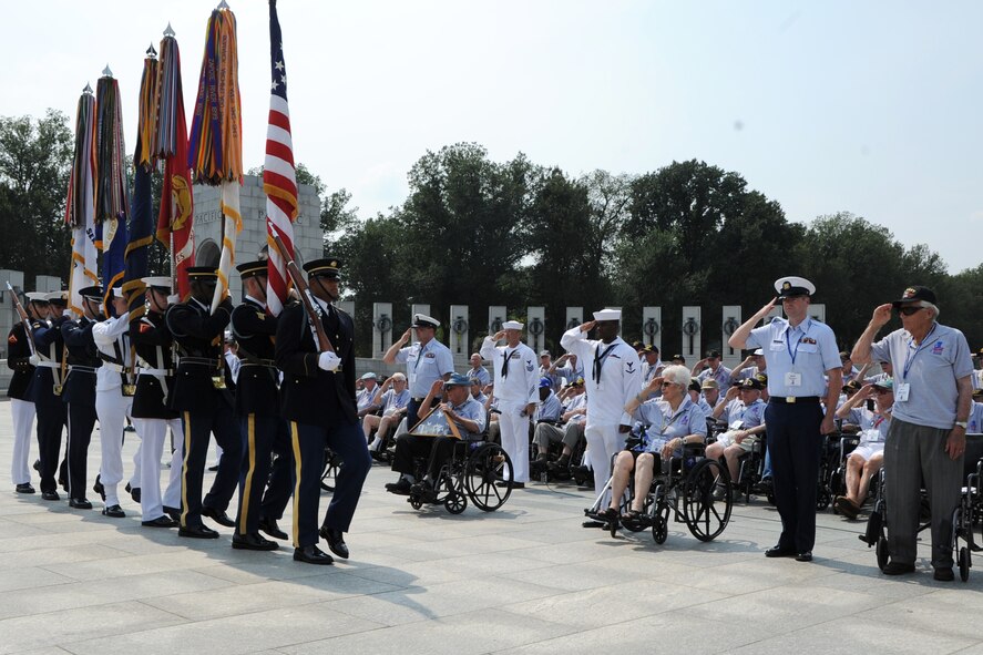 The USAF Honor Guard joins a Joint Service Color Team to pay tribute to
World War II veterans from the Chicago area during a Wreath Ceremony at the
National World War II Memorial on Sep. 2. The event was hosted by Honor
Flight Chicago in honor of World War II veterans from the Chicago area.
Honor Flight Chicago was founded to recognize World War II veterans by
flying them free-of-charge to Washington D.C. for a day of honor,
remembrance and celebration.  (U.S. Air Force photo/Staff Sgt. Matt Davis)
