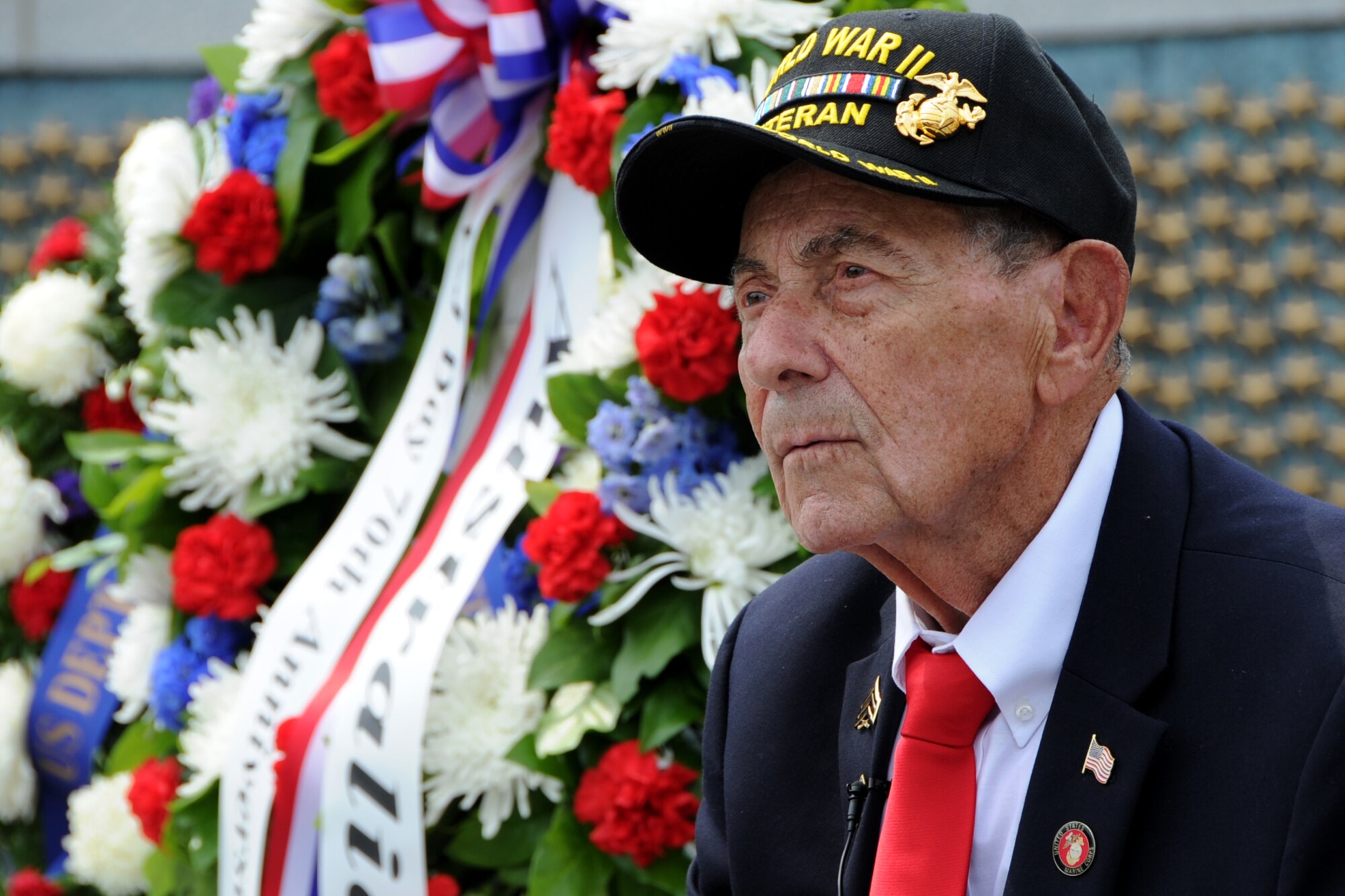 Former U.S. Marine Corps Sgt. Ernie Yamartino joins other World War II
veterans from the Chicago area during a Wreath Ceremony at the National
World War II Memorial on Sep. 2. The event was hosted by Honor Flight
Chicago in honor of World War II veterans from the Chicago area. Honor
Flight Chicago was founded to recognize World War II veterans by flying them
free-of-charge to Washington D.C. for a day of honor, remembrance and
celebration.  (U.S. Air Force photo/Staff Sgt. Matt Davis)

