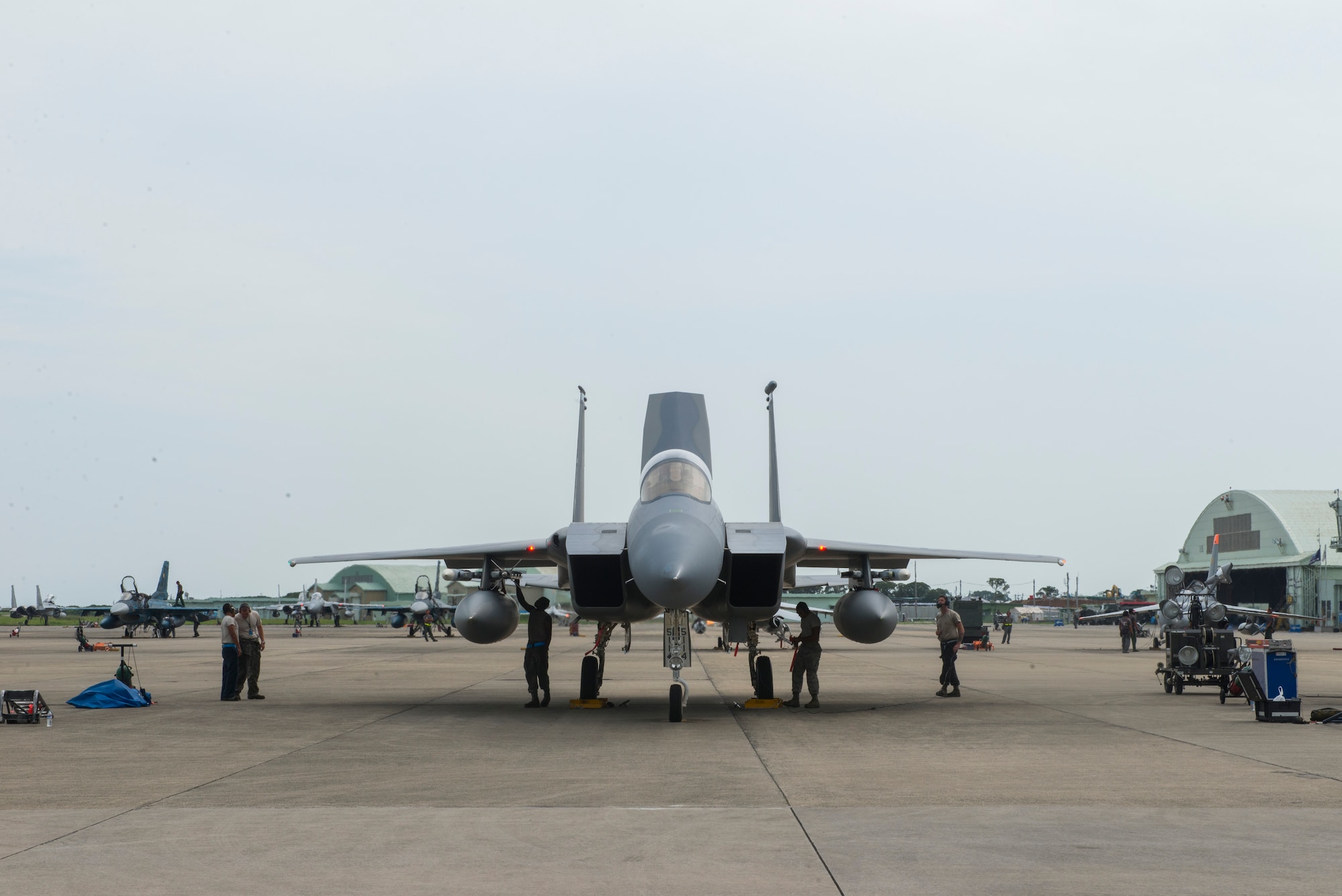 Members of the 44th Aircraft Maintenance Unit perform a final check before an F-15 Eagle takes off Tsuiki Air Base, Japan, Sept. 2, 2015. The members deployed to Tsuiki, Japan, to participate in a two-week Aviation Training Relocation from Kadena Air Base, Japan, to help build interoperablitiy between the two forces. The U.S.-Japan security alliance has remained the cornerstone of peace and security in the Indo-Asia-Pacific region for 50 years. (U.S. Air Force photo by Senior Airman Stephen G. Eigel)