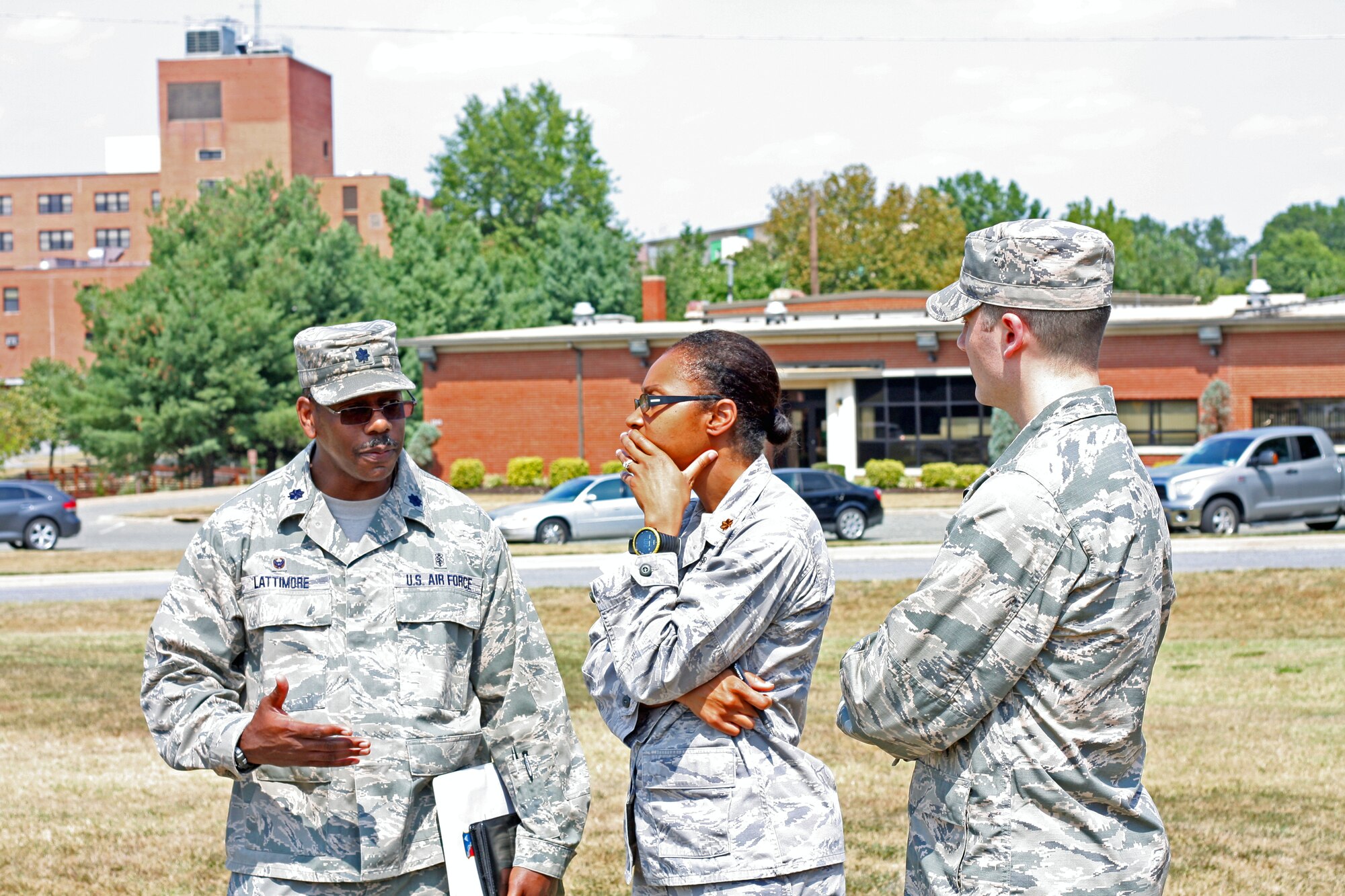 Emergency-readiness exercises are being held for first responders at the 79th Medical Wing on Joint Base Andrews in preparation for the upcoming air show on Sept. 19. Lt. Col. Andrew Lattimore, 779th Medical Support Squadron Commander discusses scenarios with his team members. Practicing for various emergency scenarios allows our first responders at the 79th Medical Wing and hospitals in the region the opportunity to train together for a myriad of contingencies. There is no expectation for an accident to occur during the 2015 Joint Base Andrews Air Show, but the exercise evaluated the response of base emergency personnel in the case of a mass casualty incident. (Photo by Major Derric Whiteside)