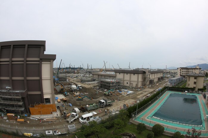 Construction continues aboard Marine Corps Air Station Iwakuni, Japan, Sep. 1, 2015. One of the purposes of these roadway modifications is to eliminate the need for vehicles to cross an aircraft taxiway and to support continued operations during the Defense Policy Review Initiative’s construction efforts, which affects approximately 77 percent of the installation. Station residents can expect permanent road development changes in the upcoming month. According to Hayden Vesprey, the DPRI planning chief aboard station, in order to support the transition of units, the air station needs additional structures and modifications to mitigate traffic from the anticipated influx of vehicles.