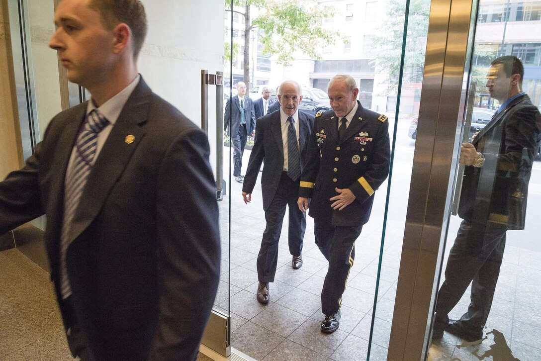 Army Gen. Martin E. Dempsey, center right, chairman of the Joint Chiefs of Staff, arrives to speak to members of Business Executives for National Security in Washington, D.C., Sept. 2, 2015. The nonpartisan, nonprofit organization supports the U.S. government by applying best business practice solutions to national security problems. DoD photo by U.S. Army Staff Sgt. Sean K. Harp