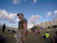 Sgt. Waldemar Perez, 430th Quartermaster Company Army Weight Control Program NCOIC, motivates the participants of his "boot camp" training.