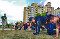Sgt. Waldemar Perez, 430th Quartermaster Company Army Weight Control Program NCOIC, motivates the participants of his "boot camp" training.