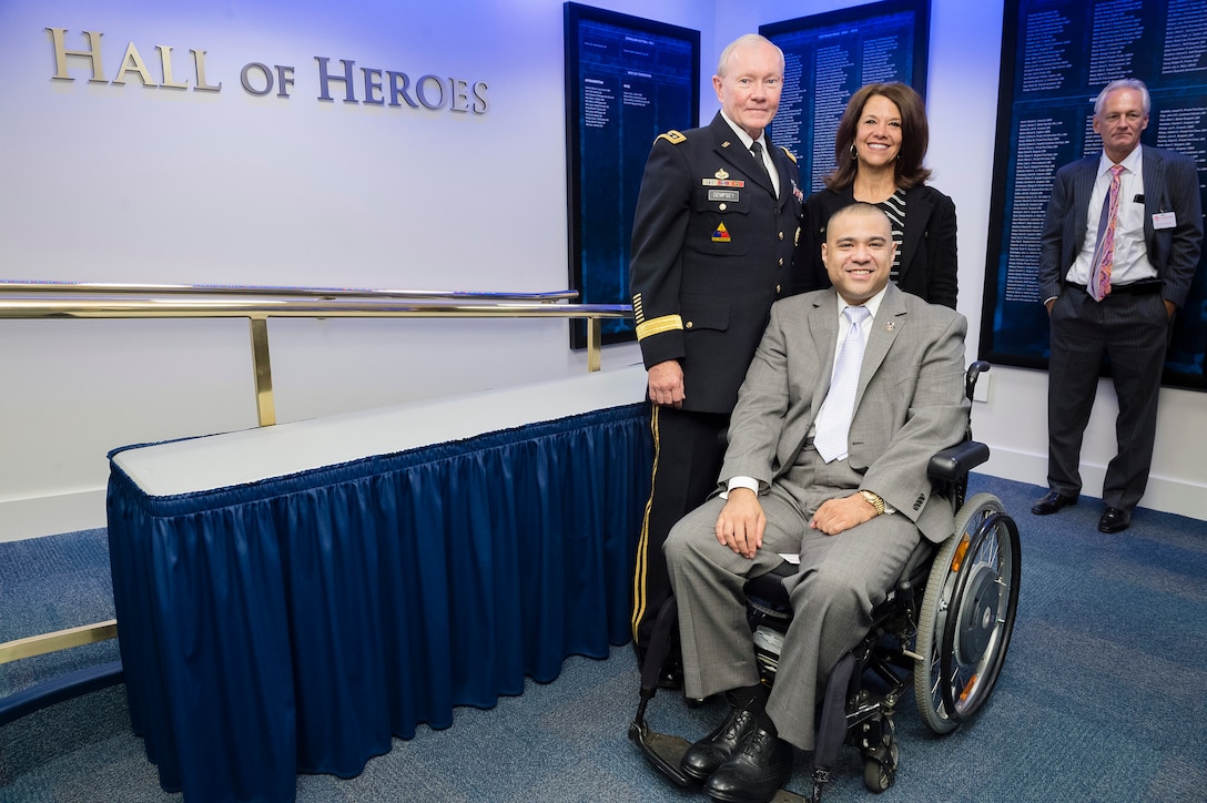 Army Gen. Martin E. Dempsey, chairman of the Joint Chiefs of Staff, poses with participants during the annual Newman's Own Awards ceremony in the Hall of Heroes at the Pentagon, Sept. 2, 2015. DoD photo by U.S. Army Staff Sgt. Sean K. Harp

 
