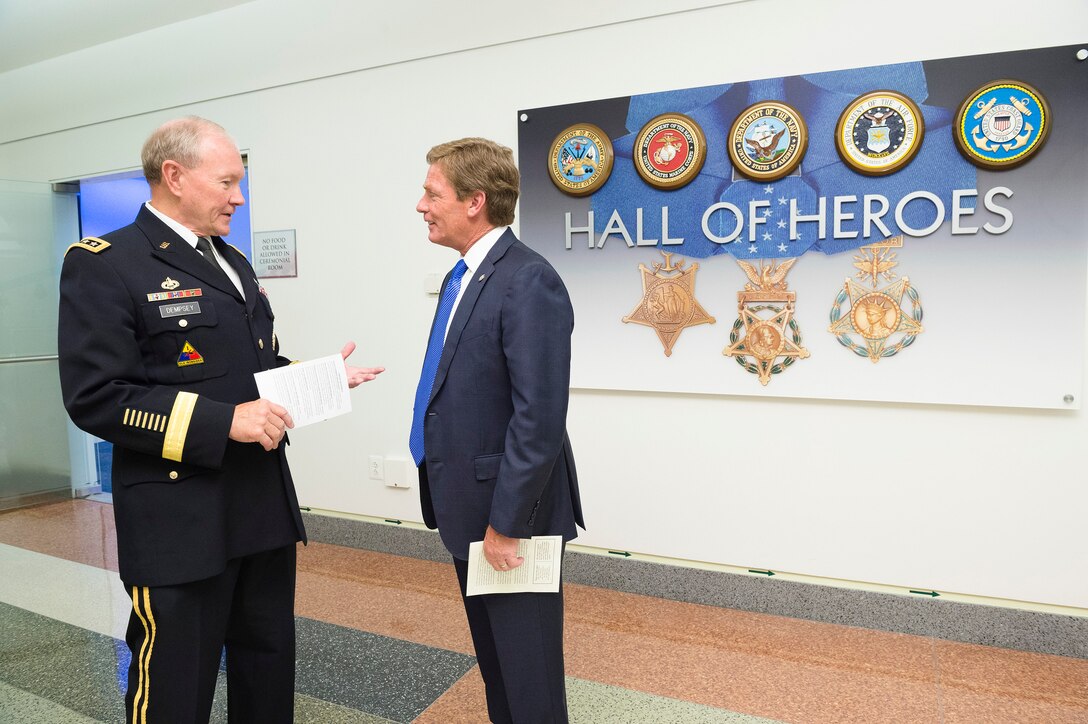 Army Gen. Martin E. Dempsey, left, chairman of the Joint Chiefs of Staff, speaks to Kenneth Fisher, Fisher House Foundation’s chairman and CEO, during the annual Newman's Own Awards ceremony in the Hall of Heroes at the Pentagon, Sept. 2, 2015. DoD photo by U.S. Army Staff Sgt. Sean K. Harp