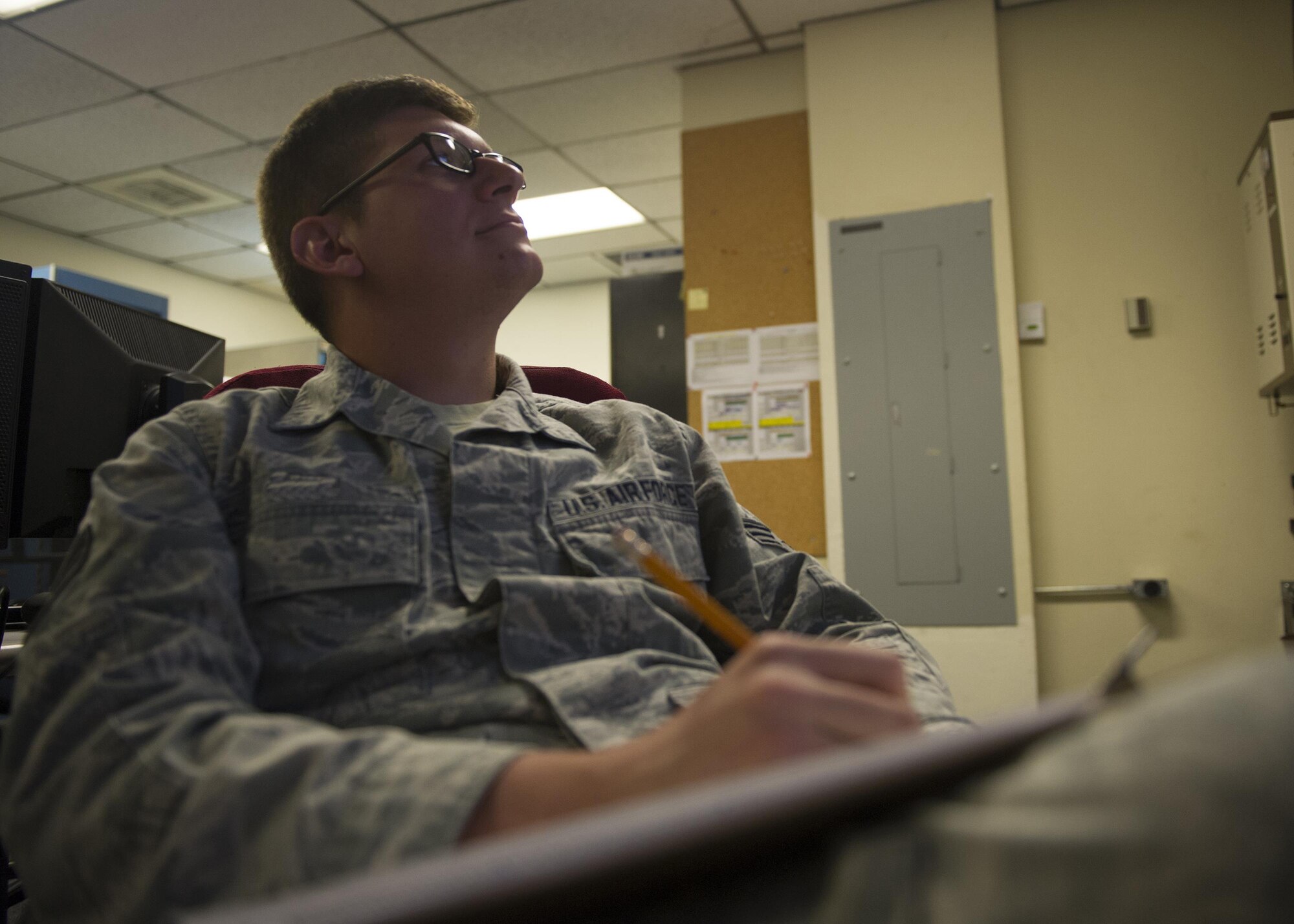 Senior Airman Christopher, a member of the National Air and Space Intelligence Center, tallies hits from pre-1980’s surface to air missile systems during a Red Flag exercise Thursday, Aug. 20, 2015 at Nellis Air Force Base, Nev. NASIC provides real-time documentation to help train both U.S. and allied nations’combat air forces. The exercise gives pilots the experience of multiple, intensive air combat sorties in the safety of a training environment. (U.S. Air Force photo illustration by Senior Airman Justyn Freeman)