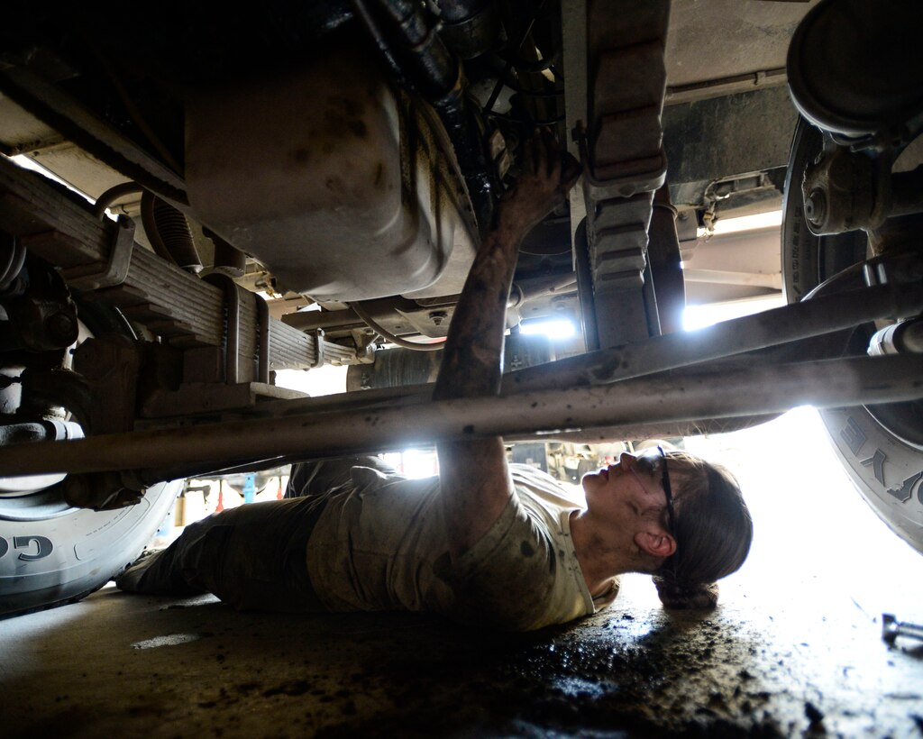 Staff Sgt. Saber Barrera, with 386th Expeditionary Logistics Readiness Squadron firetruck and refueling maintenance, works with a co-worker to replace an engine starter in Southwest Asia, Aug. 27, 2015. The Airmen support Operation Inherent Resolve, which is intended to reflect the deep commitment of the U.S. and partner nations in the region and around the globe to eliminate the Islamic State of Iraq and the Levant terrorist group and the threat imposed on Iraq. (U.S. Air Force photo/Racheal E. Watson)