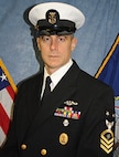 Master Chief Eric R. Playdon is a native of Lawrence, Mass. and graduated high school in 1986. He enlisted in the U.S Navy January 1992 and attended recruit training at Recruit Training Command Orlando, Fla., with follow on training at Electronic Technician “A” School. He then completed initial qualification and certification in the Navy Nuclear Propulsion Program’s training pipeline at Naval Nuclear Power School (NNPS) Orlando, Fla. and Naval Nuclear Power Training Unit (NPTU) Ballston Spa, N.Y., respectfully.