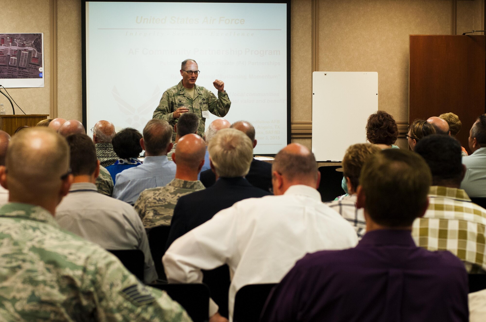 U.S. Air Force Col. Michael L. Downs, 17th Training Wing Commander, opens the discussion for the Air Force Community Partnership Program at Angelo State University, San Angelo, Texas, Sept. 3, 2015. Along with refreshing and exploring old ideas, the leaders discussed new programs and modifications to existing ones. (U.S. Air Force photo by Senior Airman Scott Jackson/released)