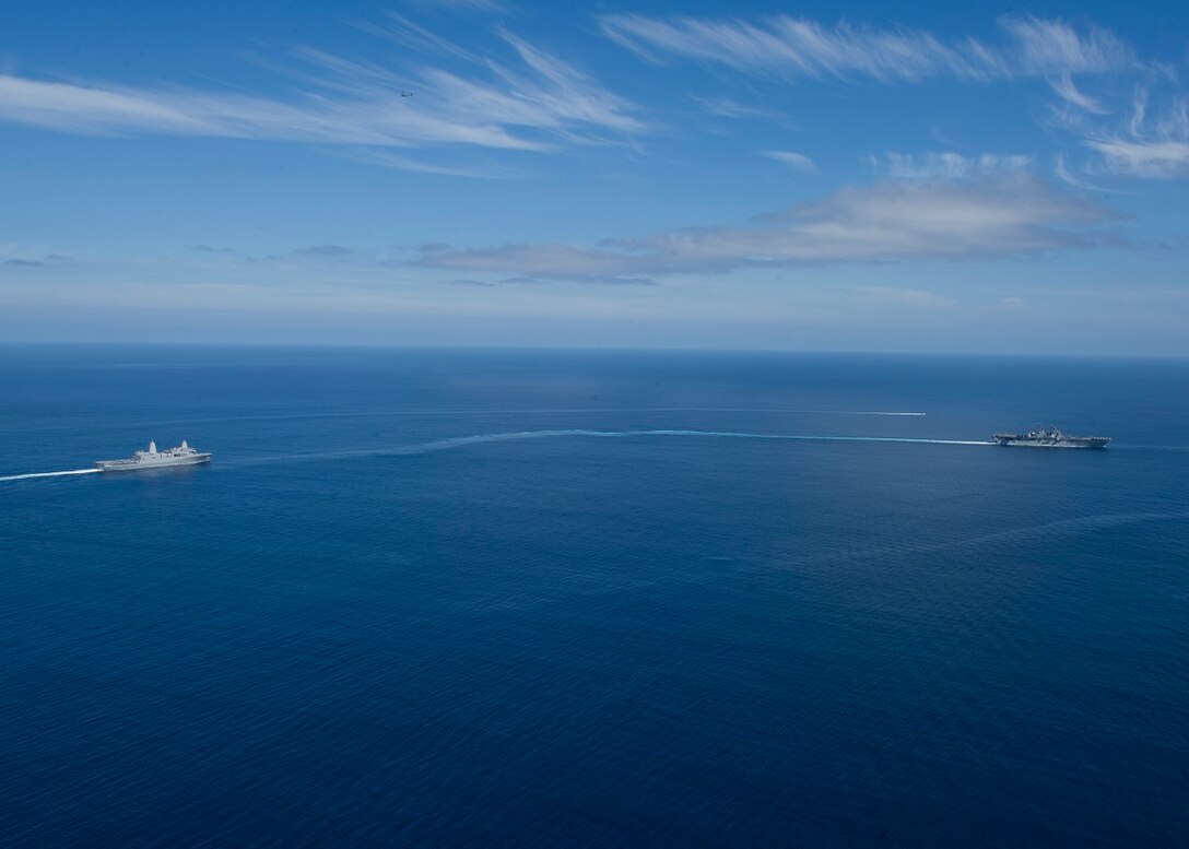 150902-N-GM561-2175 PACIFIC OCEAN (Sept. 2, 2015) The amphibious assault ship USS Boxer (LHD 4) and the amphibious transport dock USS New Orleans (LPD 18) participate in a simulated strait transit. Boxer is currently underway off the coast of Southern California participating in Dawn Blitz 2015 (DB-15). DB-15 is a multinational training exercise being conducted by Expeditionary Strike Group 3 (ESG-3) and 1st MEB to build U.S., Japan, Mexico and New Zealand’s amphibious, and command and control capabilities through live, simulated, and constructive military training activities. (U.S. Navy photo by Mass Communication Specialist 3rd Class Veronica Mammina/Released)