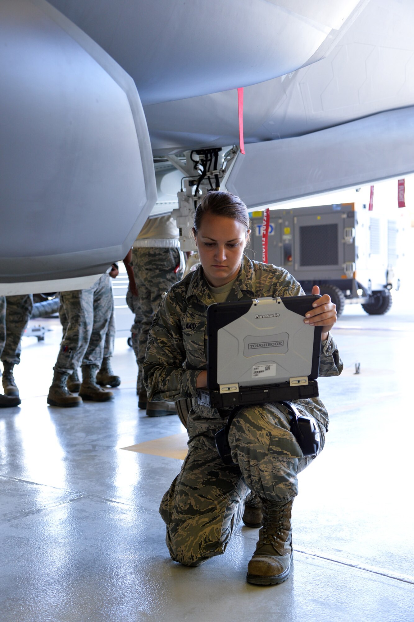 Senior Airman Samantha Callaway, an Air Force reservist in the 419th Aircraft Maintenance Squadron, performs a routine inspection on an F-35A’s internal weapons bay at Hill Air Force Base Sept. 3. Hill received the Air Force’s first operational F-35s Sept. 2, and maintenance personnel in the 419th Fighter Wing are already hard at work, getting hands-on training to become experts in fifth-generation technology. When fully trained, Callaway will be part of the 419th FW’s first certified weapons crew and will help train other Airmen in F-35 maintenance. (U.S. Air Force photo/R. Nial Bradshaw)