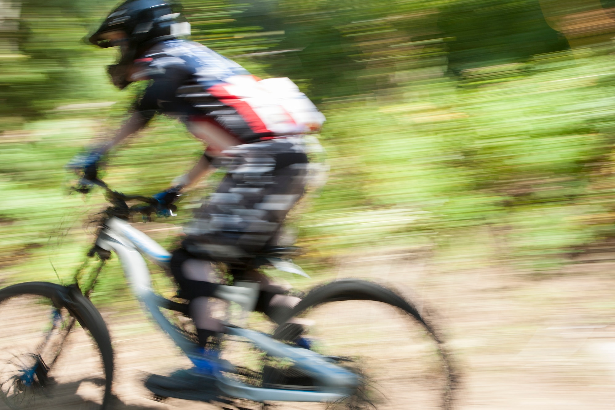 Airman 1st Class Brad Hoffler, 90th Missile Security Forces Squadron, rides a mountain biking trail on Mount Werner in the Routt National Forest, Colo., Aug. 29, 2015. Hoffler and 18 other riders from F.E. Warren Air Force Base participated in an Outdoor Recreation trip which took them to a downhill mountain bike park. (U.S. Air Force photo by Lan Kim)