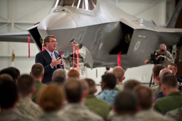 Defense Secretary (Dr.) Ash Carter addresses Nellis Airmen and Coalition partners during an all call inside the Lightning Aircraft Maintenance Unit hangar at Nellis Air Force Base, Nev., Aug. 26, 2015. During the Secretary’s visit to Nellis he observed Red Flag 15-4 and spoke to Airmen and Coalition partners. During the all call, Carter took questions from service members and addressed issues relating to budgets, force retention, morale, and operational priorities. Carter, the nation’s 25th Defense Secretary, was sworn into the position earlier this year on February 17. (U.S. Air Force photo by Senior Airman Joshua Kleinholz)