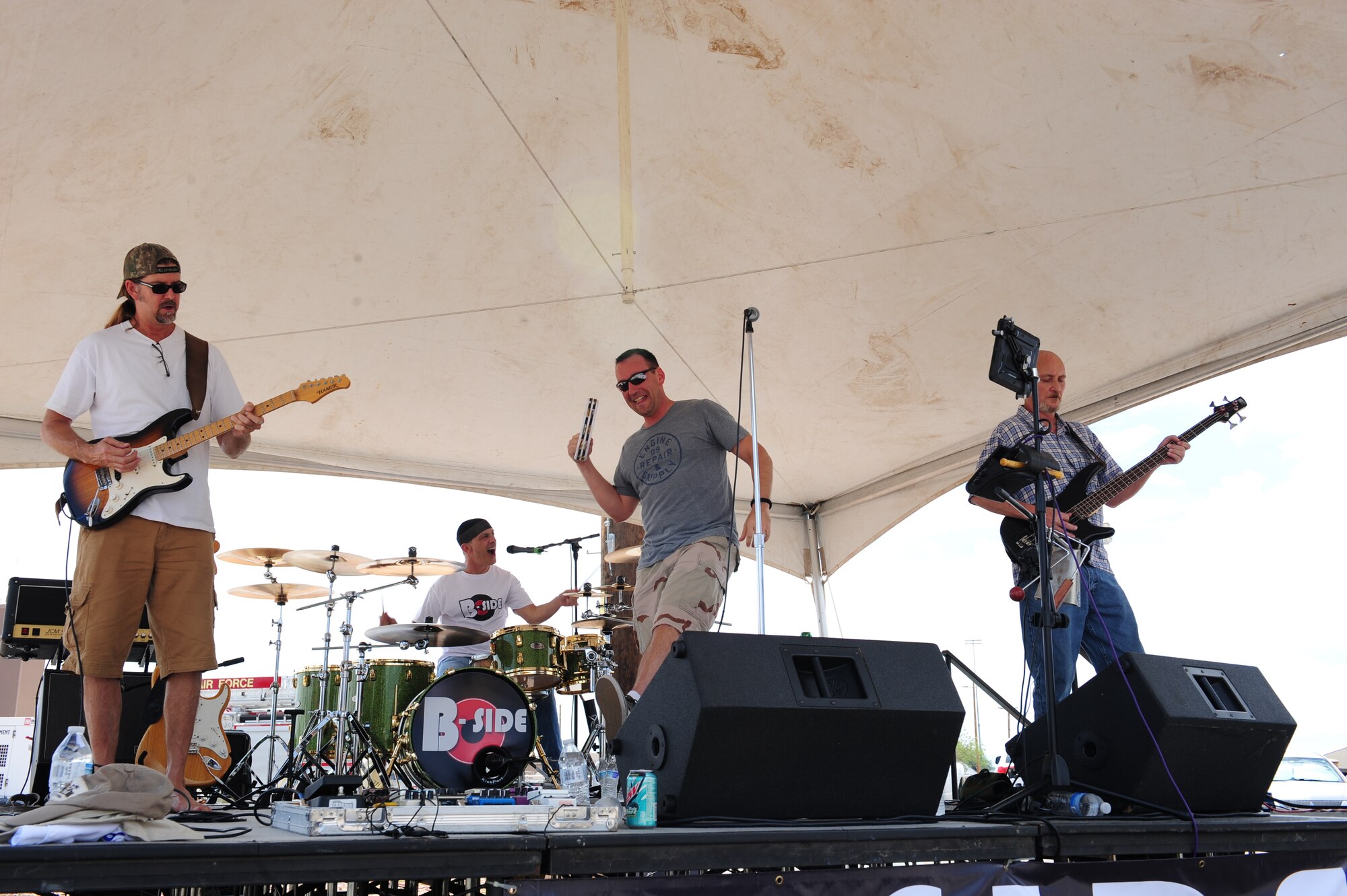 The B-Side band performs during a “Welcome Home” barbecue at Davis-Monthan Air Force Base Ariz., Sept. 3, 2015. The Tucson community members hosted the barbecue for all Desert Lightning Team Airmen to have fun and enjoy time with their friends and families after completing the largest deployment cycle in D-M history. (U.S. Air Force photo by Airmen 1st Class Cheyenne A. Powers/Released)