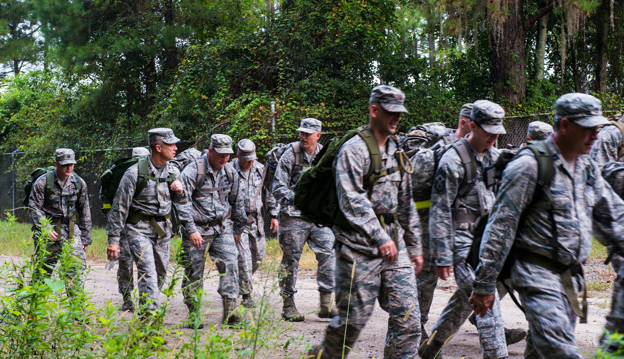 U.S. Air Force Maj. Gen. Mark Kelly, Ninth Air Force commander, and Airmen from the 93d Air Ground Operations Wing complete the final stretch of a ruck march during his visit Sept. 1, 2015, at Moody Air Force Base, Ga. Kelly marched four miles to experience a normal 93d AGOW physical fitness regimen. (U.S. Air Force photo by Airman 1st Class Ceaira Tinsley/Released)