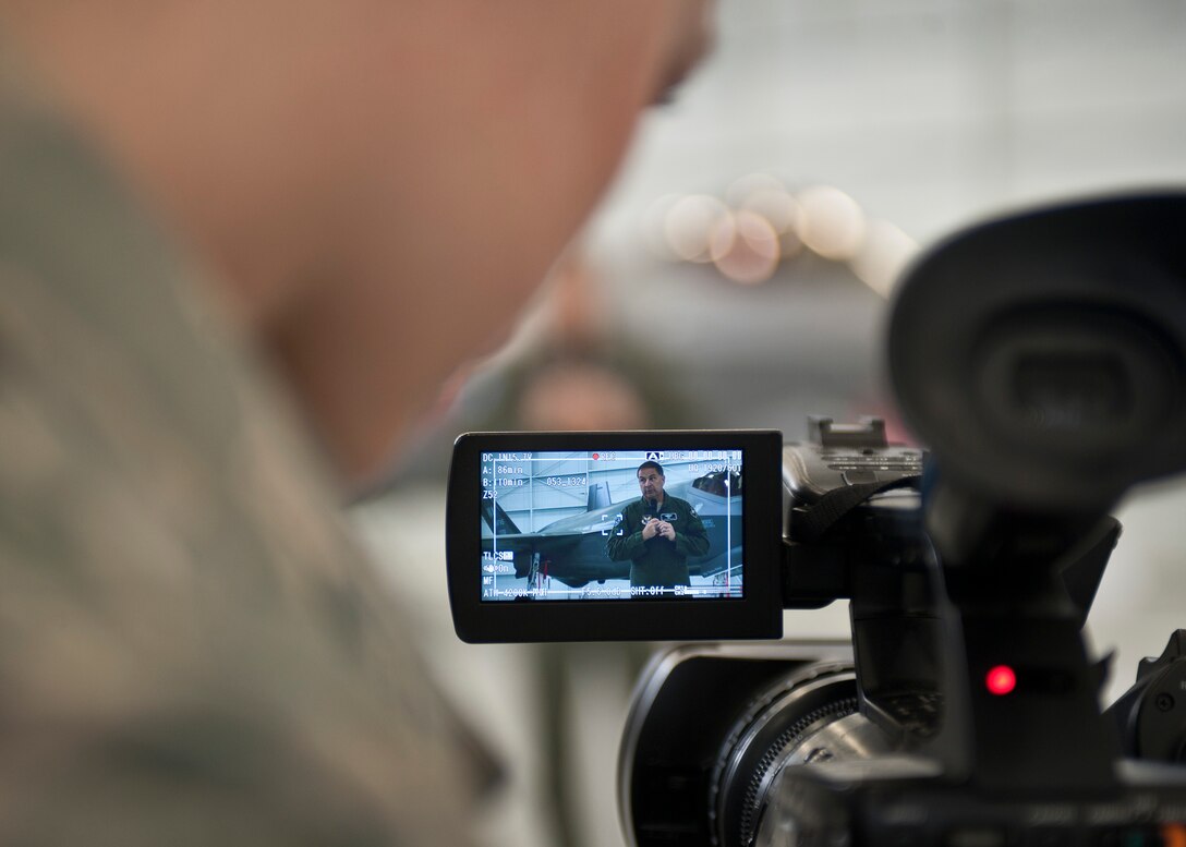 Lt. Gen. Christopher C. Bogdan, the program executive officer for the F-35 Lightning II Joint Program Office in Arlington, Va., is recorded on video during his speech to Airmen and civilian employees who work on the F-35A Lightning II at Nellis Air Force Base, Nev., Aug. 27, 2015. Bogdan also served as the program executive officer for the KC-46 Tanker Modernization Directorate, Wright-Patterson AFB, Ohio. (U.S. Air Force photo by Staff Sgt. Siuta B. Ika)