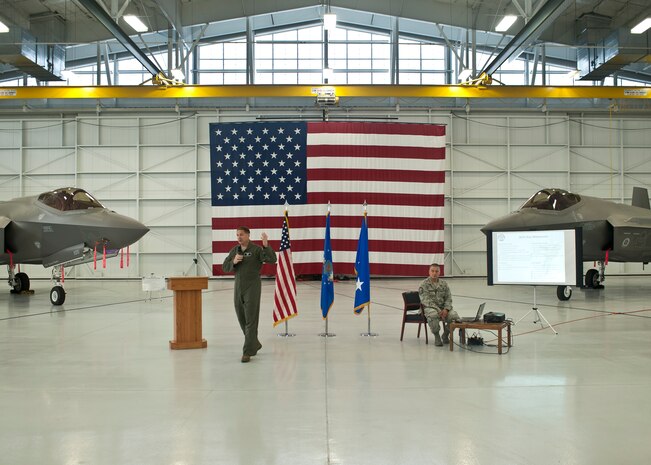 Lt. Gen. Christopher C. Bogdan, the program executive officer for the F-35 Lightning II Joint Program Office in Arlington, Va., speaks to Airmen and civilian employees who work on the F-35A Lightning II at Nellis Air Force Base, Nev., Aug. 27, 2015. Bogdan visited Nellis AFB to share his views on where the program is heading, and to thank the Airmen and industry partners who made it possible. (U.S. Air Force photo by Staff Sgt. Siuta B. Ika) 