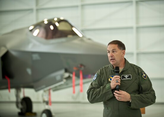 Lt. Gen. Christopher C. Bogdan, the program executive officer for the F-35 Lightning II Joint Program Office in Arlington, Va., speaks to Airmen and civilian employees who work on the F-35A Lightning II at Nellis Air Force Base, Nev., Aug. 27, 2015. Bogdan visited Nellis AFB to share his views on where the program is heading, and to thank the Airmen and industry partners who made it possible. (U.S. Air Force photo by Staff Sgt. Siuta B. Ika)